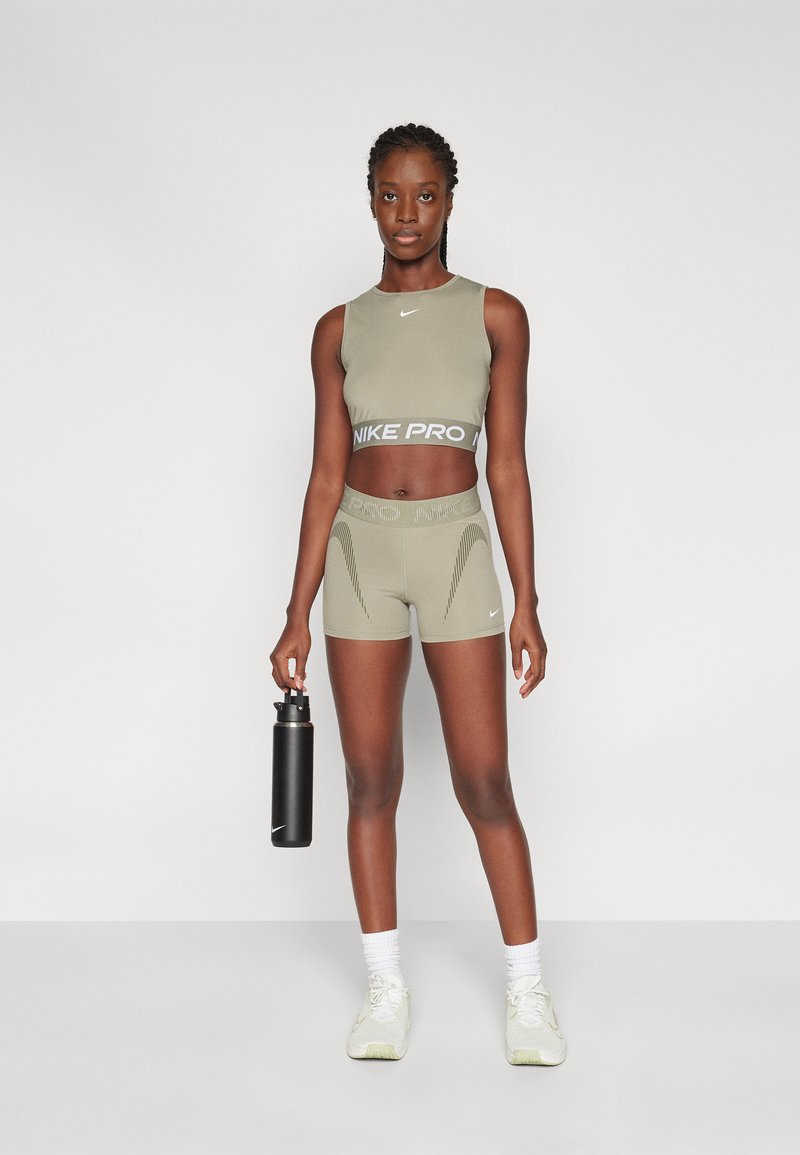 Nike Performance CROP TANK - Débardeur