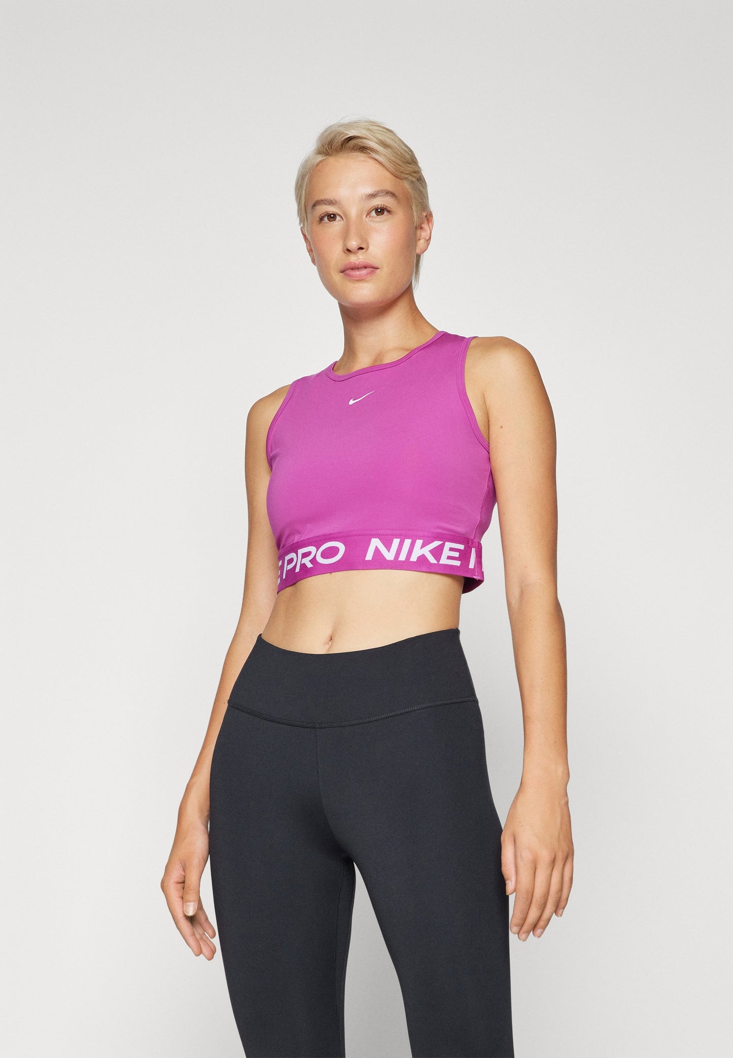 Nike Performance CROP TANK - Débardeur